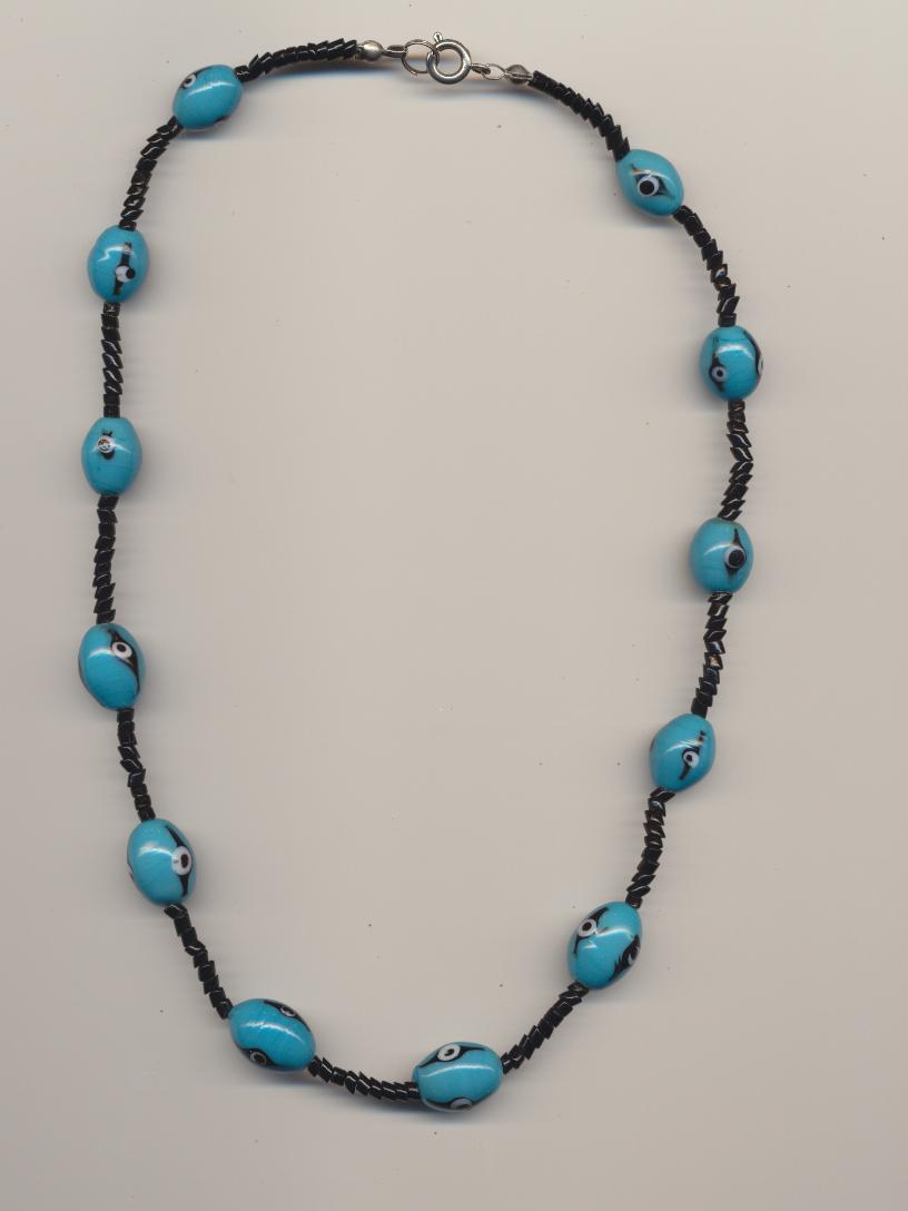Unique handcrafted necklace made of hand made blue glass eyebeads from India and small oblique cut drawn black glass beads, 1990's, length 17'' 42cm.